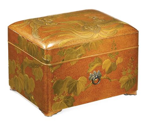 japanese red lacquered and gilt decorated metal mount box|A GILTMETAL MOUNTED RED.